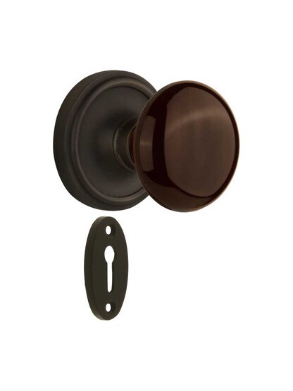 Classic Rosette Mortise-Lock Set with Brown Porcelain Knobs in Oil-Rubbed Bronze.